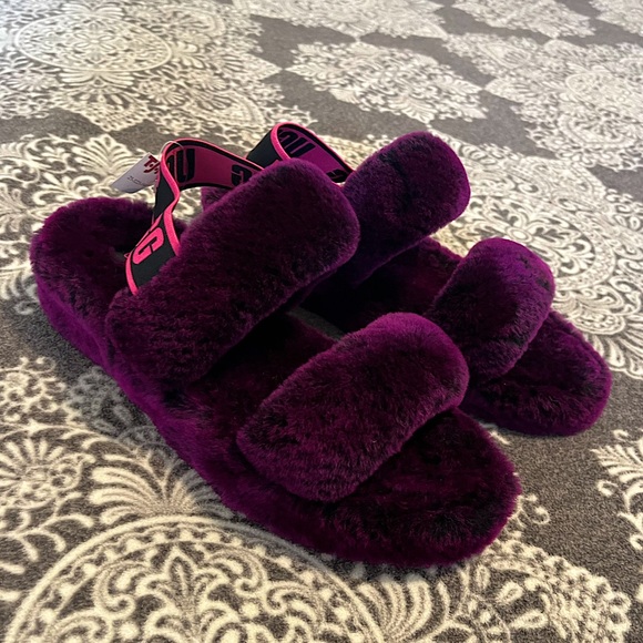 UGG Shoes - NWT UGG slippers size 8. Brand new! Purple color. Authentic! Super comfortable!